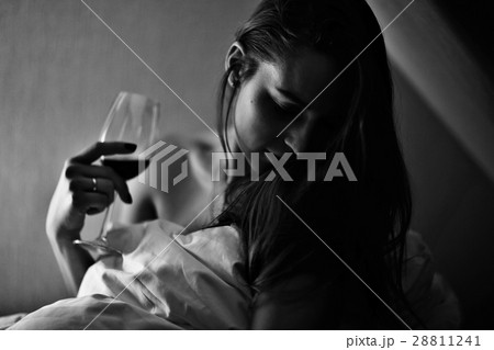young woman a glass of wine house young woman a glass of wine house 28811241