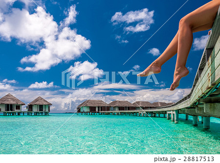 Woman at beach jetty 28817513