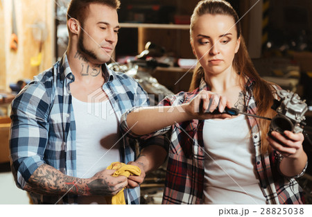 Responsible kind girl fixing nuts 28825038