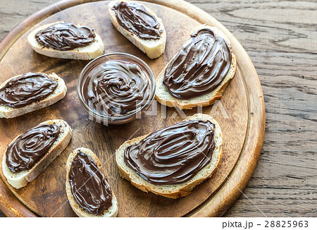 Slices of baguette with chocolate cream Slices of baguette with chocolate cream 28825963