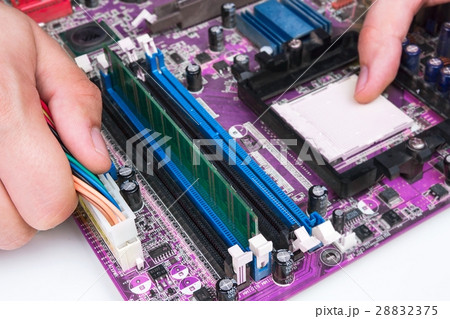 Technician repairing computer hardware 28832375
