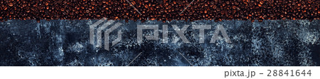 Coffee beans on a dark background of a concrete 28841644