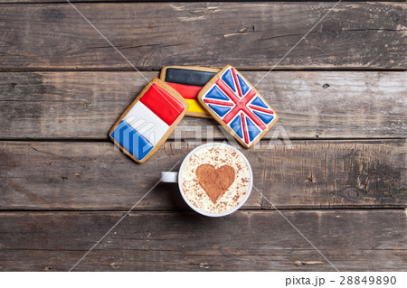 flags shaped cookies and cup of coffee 28849890