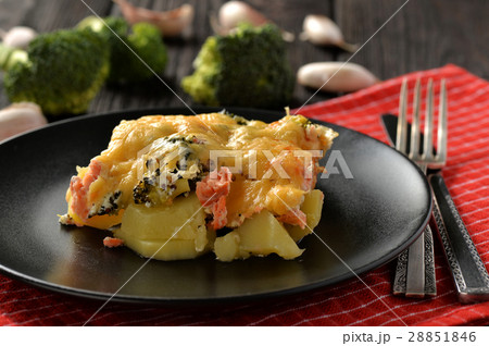 Casserole with fish (salmon),potatoes and broccoli 28851846