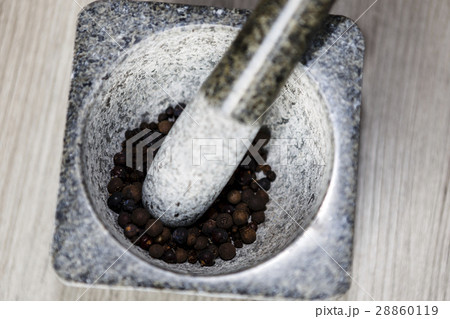 stone mortar on wooden background 28860119