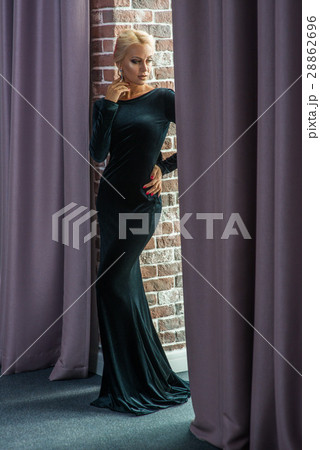 Beautiful woman in evening black dress 28862696