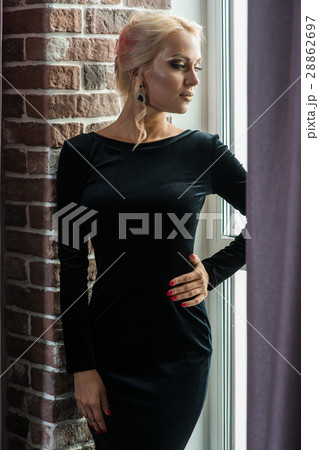 Beautiful woman in evening black dress 28862697