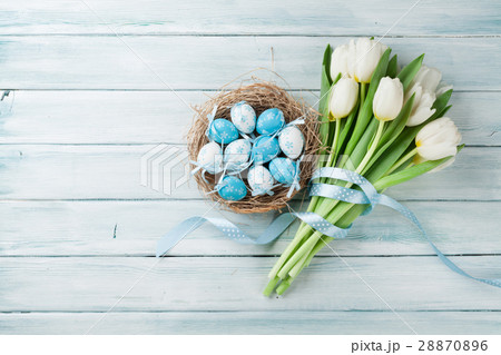 Easter eggs and white tulips 28870896