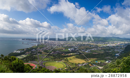 Ibusuki town skyline and blue sky from hill top 28872958