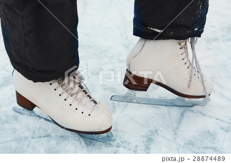 skate boots on teen girl feet close up photo  28874489