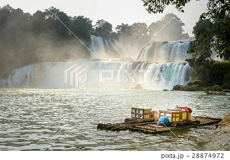 View at Detian waterfalls with bamboo raft View at Detian waterfalls with bamboo raft 28874972