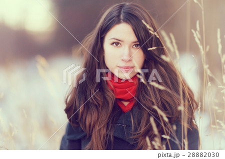 Spring portrait of a girl outside in a sweater Spring portrait of a girl outside in a sweater 28882030