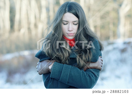 Winter portrait of a woman of stress 28882103