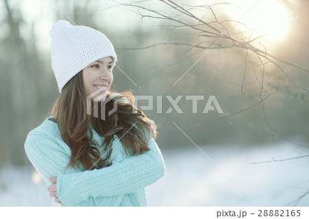 Spring portrait of a girl outside in a sweater Spring portrait of a girl outside in a sweater 28882165