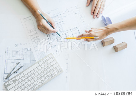 Team of architects people in group on construciton site check do 28889794