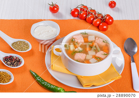 Salmon soup seasoned with dill in white bowl Salmon soup seasoned with dill in white bowl 28890070