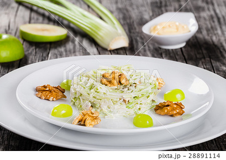 Waldorf Salad with walnuts, green apple and celery 28891114