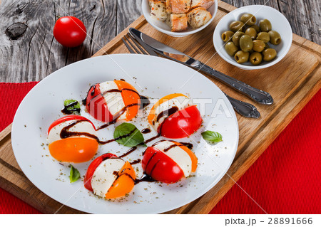 tomato. mozzarella, basil caprese summer salad tomato. mozzarella, basil caprese summer salad 28891666