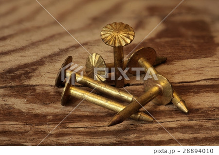 heap of of gold nails macro 28894010