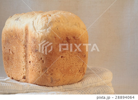 loaf of fresh wheat bread 28894064