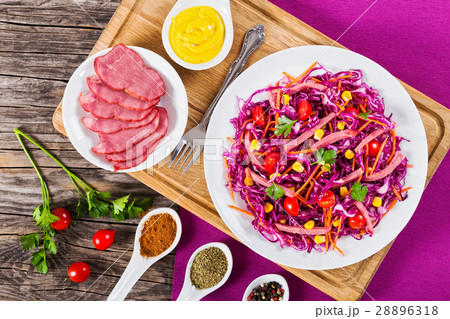 sliced smoked meat and red cabbage salad sliced smoked meat and red cabbage salad 28896318