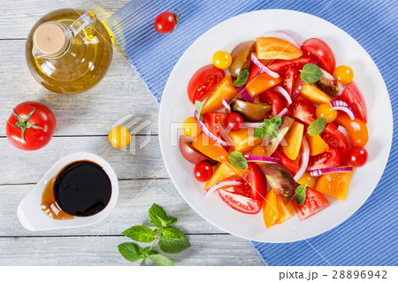 tomato salad with mint leaves and olive oil tomato salad with mint leaves and olive oil 28896942