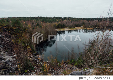 Lovely view of the lake with emerald hill 28897243