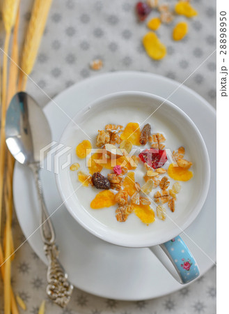Cup of yogurt with cereals 28898950