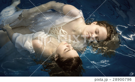 Portrait of two young girls in water 28900796