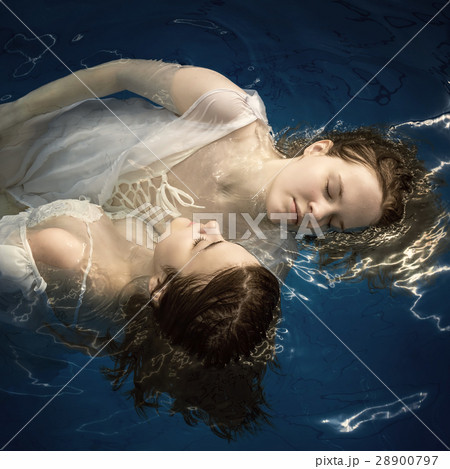 Portrait of two young girls in water 28900797