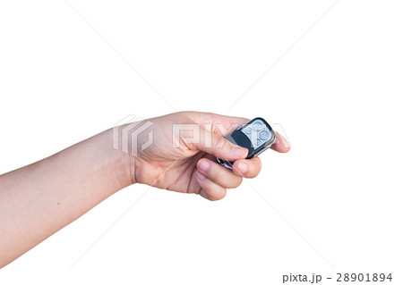 Hand holding car key isolated on white background 28901894