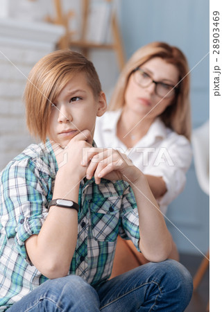 Thoughtful young male person thinking about Thoughtful young male person thinking about 28903469