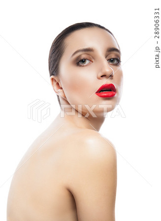 Topless woman looking over shoulder Topless woman looking over shoulder 28906331