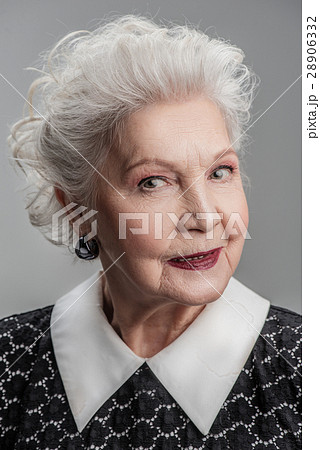 Mature lady looking at camera with interest 28906332