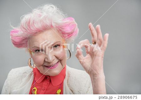 Stylish senior lady looking at camera Stylish senior lady looking at camera 28906675
