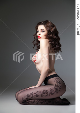 Attractive young woman wearing tights 28908371
