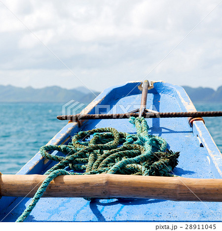 view of the island hill from the prow of a boat 28911045