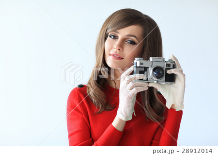 Portrait of young beautiful woman with photo camera in retro sty Portrait of young beautiful woman with photo camera in retro sty 28912014