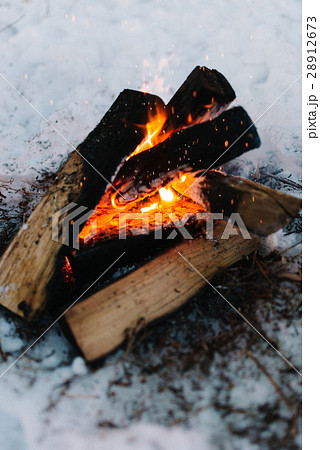 Burning firewood at campfire Burning firewood at campfire 28912673