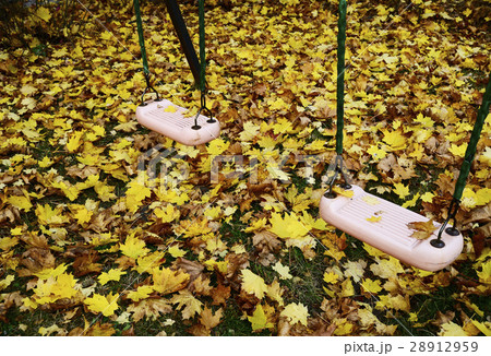 seesaw on the playground with autumn leaves 28912959