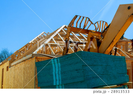 Wood frame of house under construction, Wood frame of house under construction, 28913533