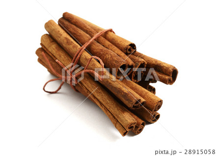 bunch of cinnamon sticks on a white background bunch of cinnamon sticks on a white background 28915058