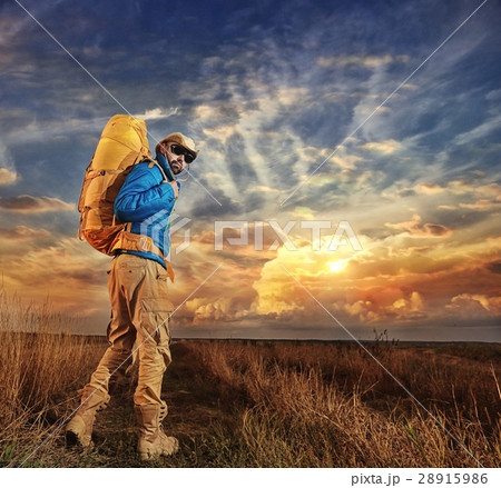 man traveler tourist landscape at sunset wildlife man traveler tourist landscape at sunset wildlife 28915986