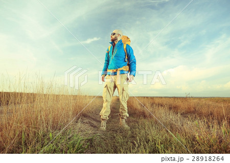 man traveler with a backpack wildlife adventure 28918264