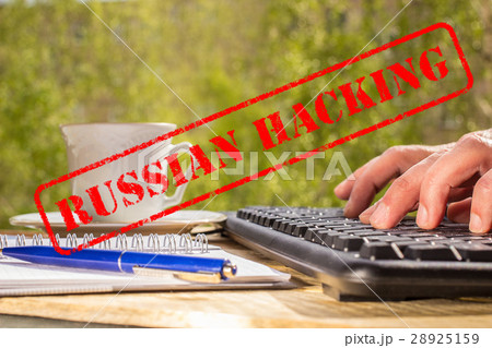 Man typing on a computer keyboard 28925159