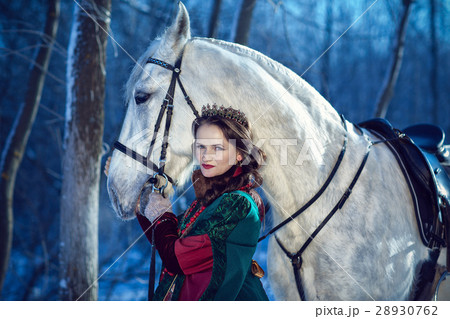 girl standing next to a white horse girl standing next to a white horse 28930762