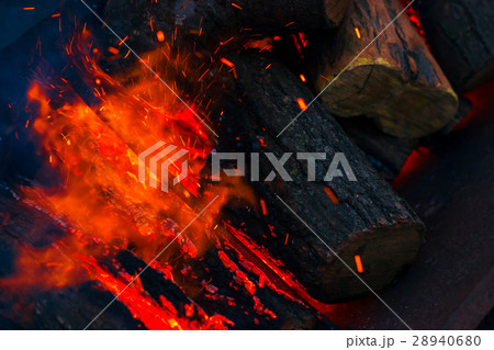 Beautiful burning fire flame background and coals Beautiful burning fire flame background and coals 28940680