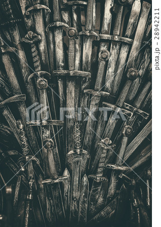 Metal knight swords background. Close up. Metal knight swords background. Close up. 28942211