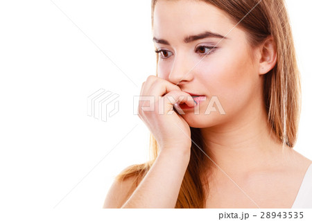 Teenage woman looking worried, thinking about something Teenage woman looking worried, thinking about something 28943535