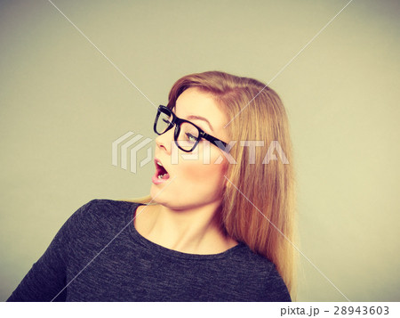 Woman in eyeglasses having shocked face expression 28943603